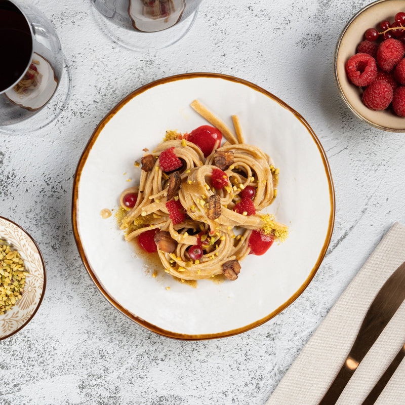 Umami Tagliatelle with Porcini Butter, Roasted Chestnuts, Raspberry and Currant Sauce, Pistachios