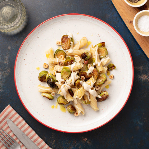 Sourdough Vortici with Brussels Sprouts, tahini dressing and roasted hazelnuts